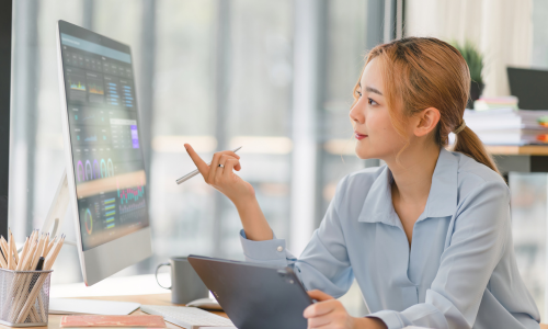 A woman monitoring data or information coming in